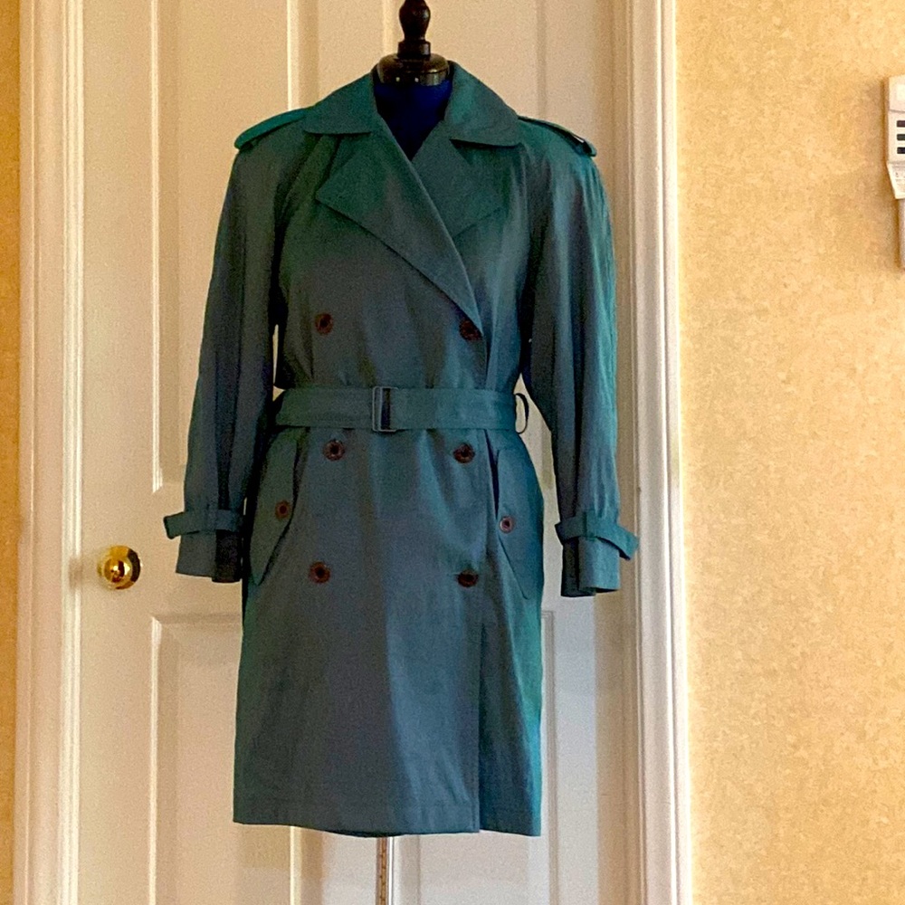 Beautiful iridescent green color with Pink lining. Good for light rain